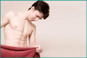 Pijn in het perineum van een man met prostatitis